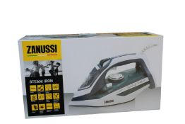 Four new Zanussi blue 2800W steam irons (ZSI 9270).