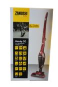 A new Zanussi Red Handy Go 2 in 1, 95W, 0.55L rechargeable cordless vacuum cleaner (ZANDX75).