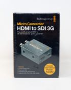A boxed as new Blackmagic Design HDMI to SDI 3G Micro Converter (Box sealed).