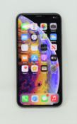 A pre-owned Apple iPhone Xs (Global/A2097) 64GB in Silver (iCloud account clear. Checkmend report