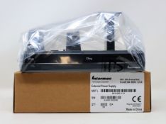 A boxed as new Intermec CN70 Single Bay Dual Battery Charger (P/N: DX1A01A20).