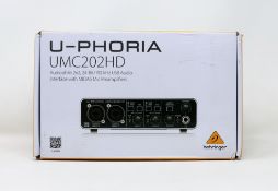A boxed as new Behringer U-PHORIA UMC202HD USB Audio Interface (Box sealed, some damage to box).