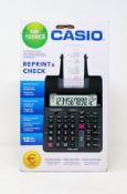 A boxed as new Casio HR-150RCE-WA-EC Printing Desktop Calculator.