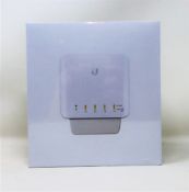 A boxed as new Ubiquiti UniFi Flex 5-Port PoE Switch (USW-Flex) (Box sealed).