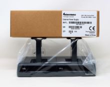 A boxed as Intermec DX2A2AA20 4 Bay Battery Charger For CN70 Barcode Scanners.