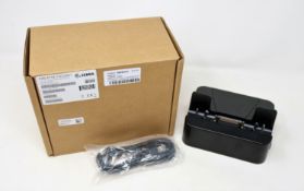 A pre-owned Zebra ETX Single Slot Charge and Communication Dock (P/N: CRD-ET5X-1SCOM1) (Boxed).
