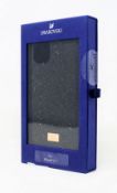 A boxed as new Swarovski High Phone Case for iPhone 11 Pro in Black (P/N: 5592031) (Box sealed).