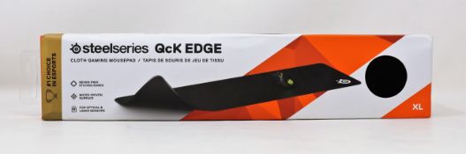 Four boxed as new Steelseries QcK Edge XL Gaming Mouse Pads in Black (Boxes sealed).