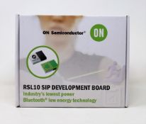 A boxed as new On Semiconductor RSL10 SIP Development Board (P/N: RSL10-SIP-001GEVB) (Box sealed).