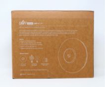 A boxed as new Ubiquiti UniFi UAP-AC-LR Long Range Indoor Access Point (Box sealed).
