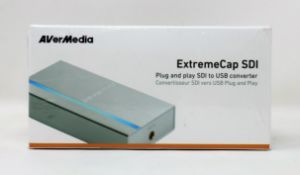 A boxed as new AVerMedia ExtremeCap SDI Plug-and-Play SDI to USB Converter (BU111) (Packaging
