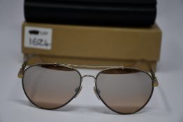 A pair of as new Burberry sunglasses.