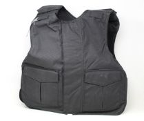 A Safe Guard Armour Patrol 1 tactical armour vest in Black, with a detachable 'Public Safety' velcro