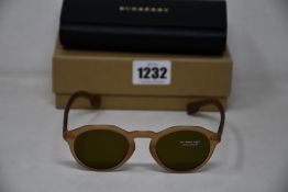 A pair of as new Burberry sunglasses.