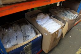 A quantity of as new flip-flops, sliders and hotel/spa style slippers.