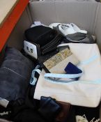 A box of pre-owned clothing and related items to include purses and wallets.