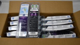 Twenty Philips Sonicare Diamond Clear standard replacement brush heads.