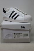 A pair of as new Prada Adidas Superstar sneakers (UK 8).
