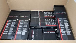 Twenty five packs of Wella color wraps mixed gold/white.