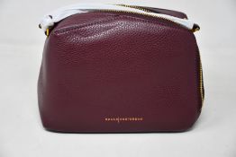 An as new Smaak Amsterdam Blake bag in burgundy.