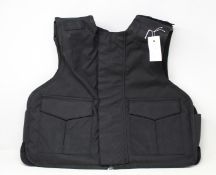 A Safe Guard Armour Patrol 1 tactical armour vest in Black, with a detachable 'Public Safety' velcro