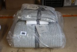 An as new Westelm duvet cover (Double) and two Westelm pillow cases.