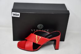 A pair of as new Versace sandals in red (IT 38.5 - RRP £590).