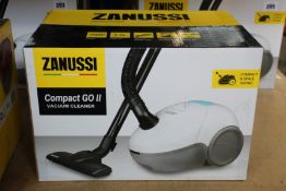 A new Zanussi Compact Go ll White, 750W, 1.5L, 5M automatic cord rewind vacuum cleaner.