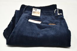 A pair of as new Nude Jeans Co. Lazy Leo navy cords (W31/L28 - RRP £135).
