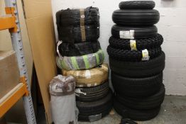 A quantity of assorted pre-owned tyres and wheels.