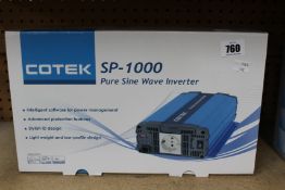 A boxed as new Cotek SP-1000-212 pure sine wave inverter.