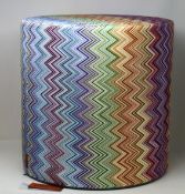 A Missoni Jarris multi-colour cylinder pouf.