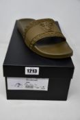 A pair of as new Versace slides (IT 46 - RRP £240).