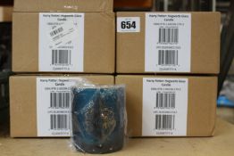 Sixteen as new Harry Potter Hogwarts glass candles.