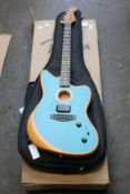 A Fender American Acoustasonic Jazzmaster - Acoustic/Electric Guitar in Ocean Turquoise.