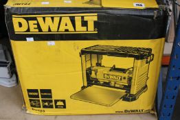 A DeWalt DW733 1800w planer/thicknesser (Some damage to box).