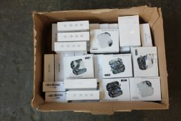 Thirty five TWS-Q25 wireless headphones in charging cases and six cshid ma10 wireless headphones