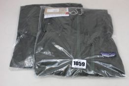 Two men's as new Patagonia Houdini jackets (M, L - RRP £83 each).