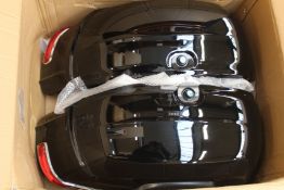 A pair of as new black Motea motorbike side luggage cases with keys.