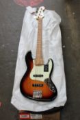 An as new Fender Player Plus Active Jazz bass guitar in 3-colour Sunburst.