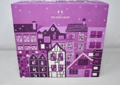 Four as new The Body Shop 2021 'Share the Joy' advent calendars.