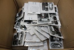 Thirty three TSA luggage locks and metal cables.