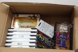 A quantity of Disney collectibles to include: seventeen Disney keys (Designs; Star Wars, Cars and