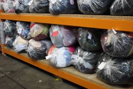 Twelve bags of pre-owned clothing and related items.