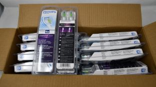 Twenty Philips Sonicare Diamond Clear standard replacement brush heads.