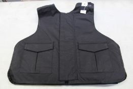 A Safe Guard Armour Patrol 1 tactical armour vest in Black, with a detachable 'Public Safety' Velcro