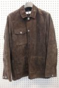 An as new Caruso brown suede jacket (TG 52).