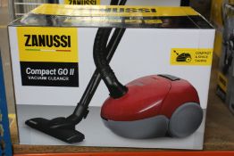 A new Zanussi Compact Go ll Red, 750W, 1.5L, 5M automatic cord rewind vacuum cleaner.