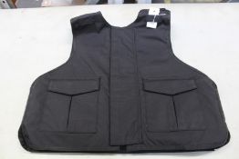 A Safe Guard Armour Patrol 1 tactical armour vest in Black, with a detachable 'Public Safety' Velcro