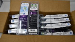 Twenty Philips Sonicare Diamond Clear standard replacement brush heads.